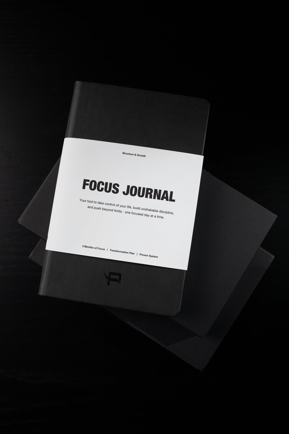 PrimeFlow Focus Journal with white band cover on dark background, "Structure & Growth" branding